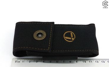 Preview: LEATHERMAN®: Nylon Sheath Holster, Black Bronze Stitching, Größe L Vorderansicht mit Lineal